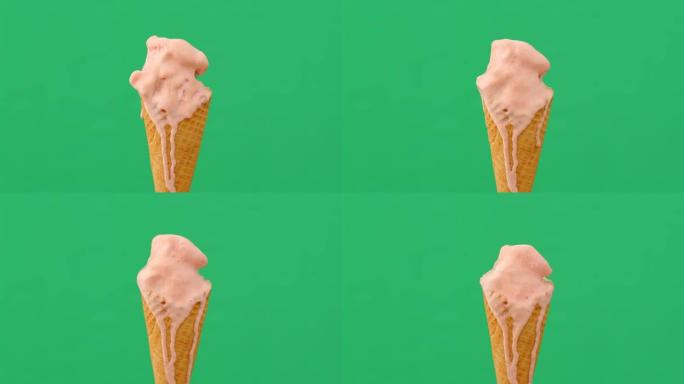 绿色背景上融化冰淇淋蛋筒的时间流逝，4K