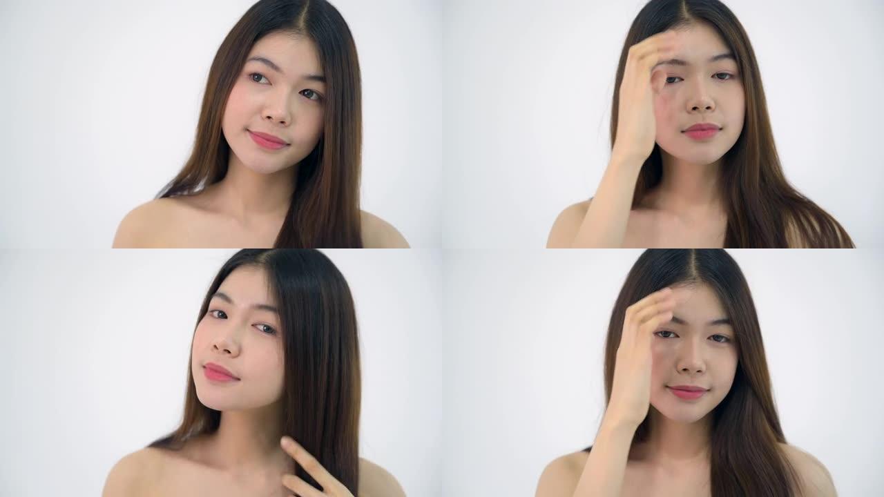 年轻的亚洲20多岁女性黑色光滑头发化妆品化妆漂亮的脸蛋白色条纹衬衫在白色背景上表达情感，用于病毒剪辑