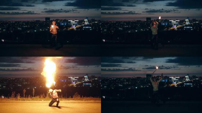 年轻的金发男性用火耍花招，男性跪下一边呼吸火，制造火球。