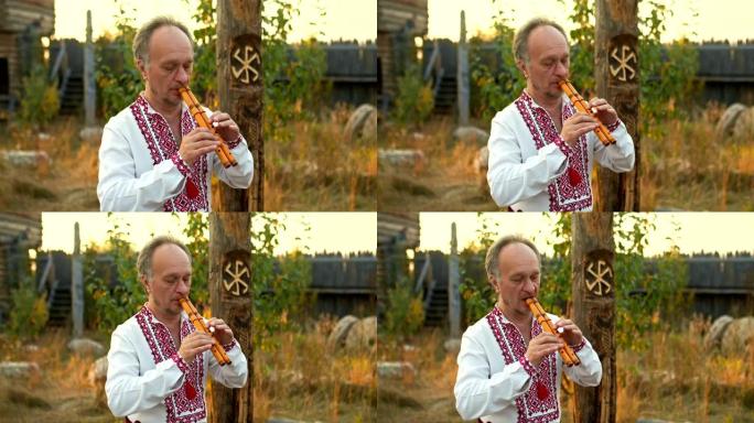 在民间传说中，一个身穿刺绣民族衬衫的男子会带着灵感吹笛。斯拉夫人吹奏风笛的习俗，仪式。肖像的观点。4