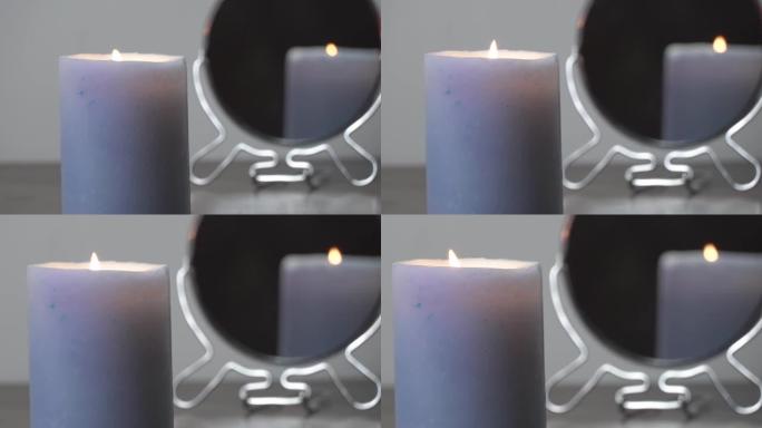 镜子中反射的点燃蜡烛的概念视频。圣诞节占卜和灵性。宗教和神圣。心理学，动机。思想的力量。永不放弃，追