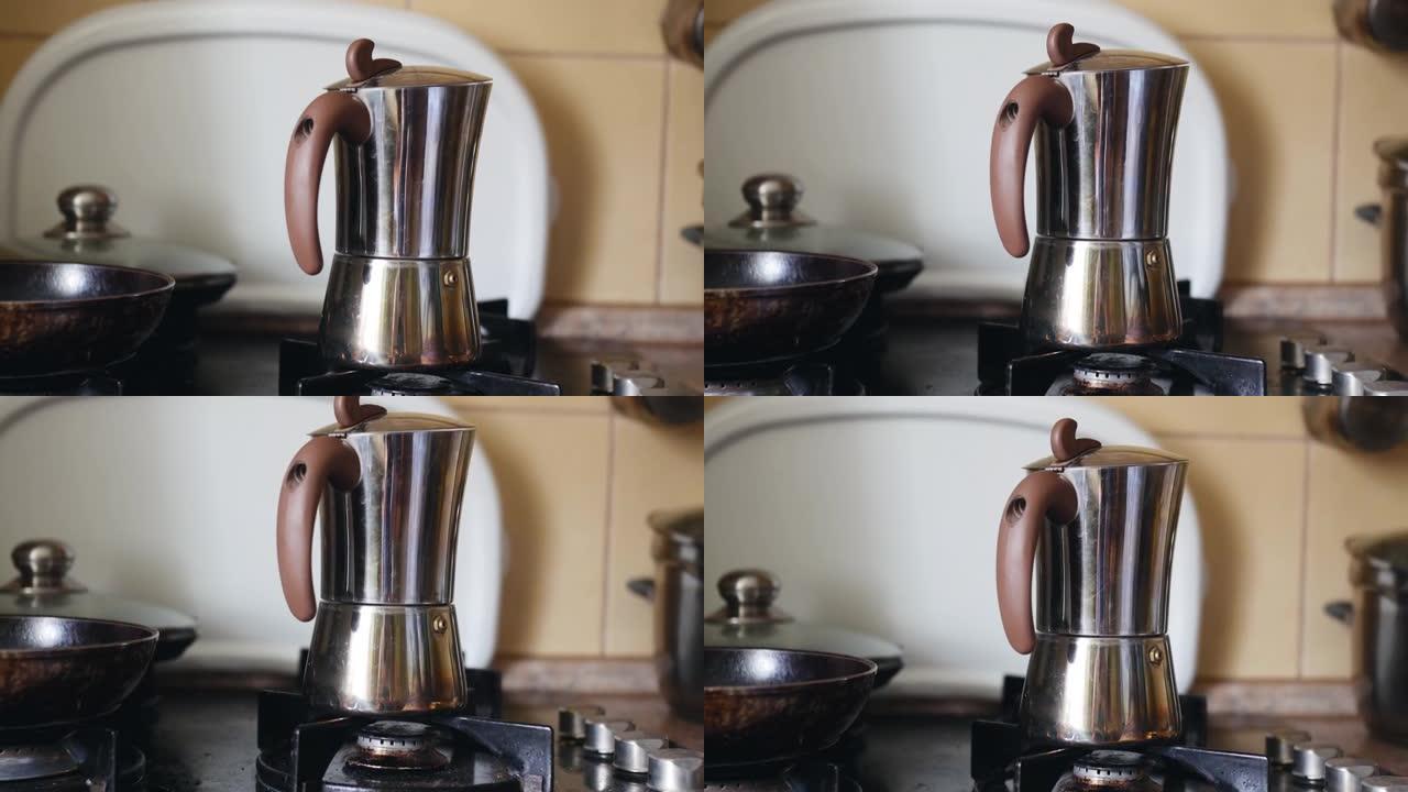 家用脏煤气炉上的间歇泉咖啡机。
