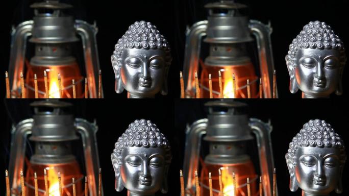 佛陀香气棒灯的镜头黑暗背景