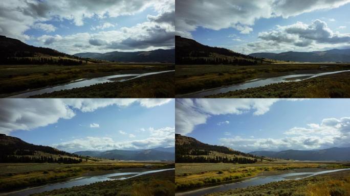 时间流逝-秋天，拉马尔河穿过黄石国家公园的拉马尔山谷，头顶乌云密布