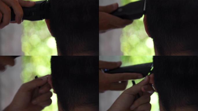 哥哥用理发器剪弟弟的头发在家库存视频