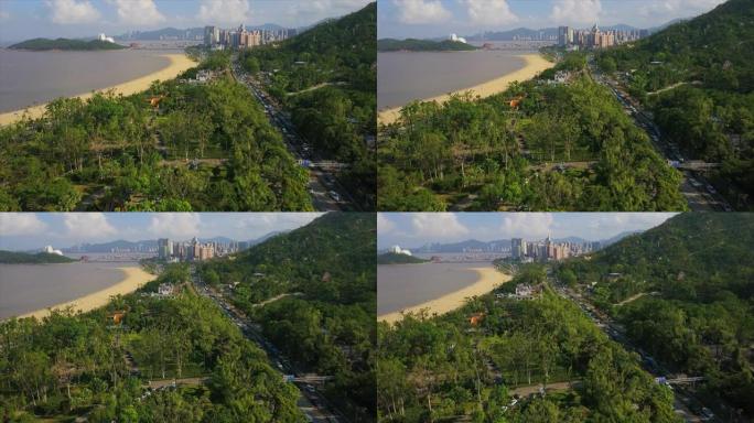 阳光明媚的日子珠海景山公园城市景观交通道路海滩空中全景4k中国