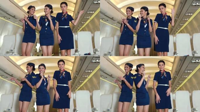 乘务人员在飞机上欢欣鼓舞地跳舞