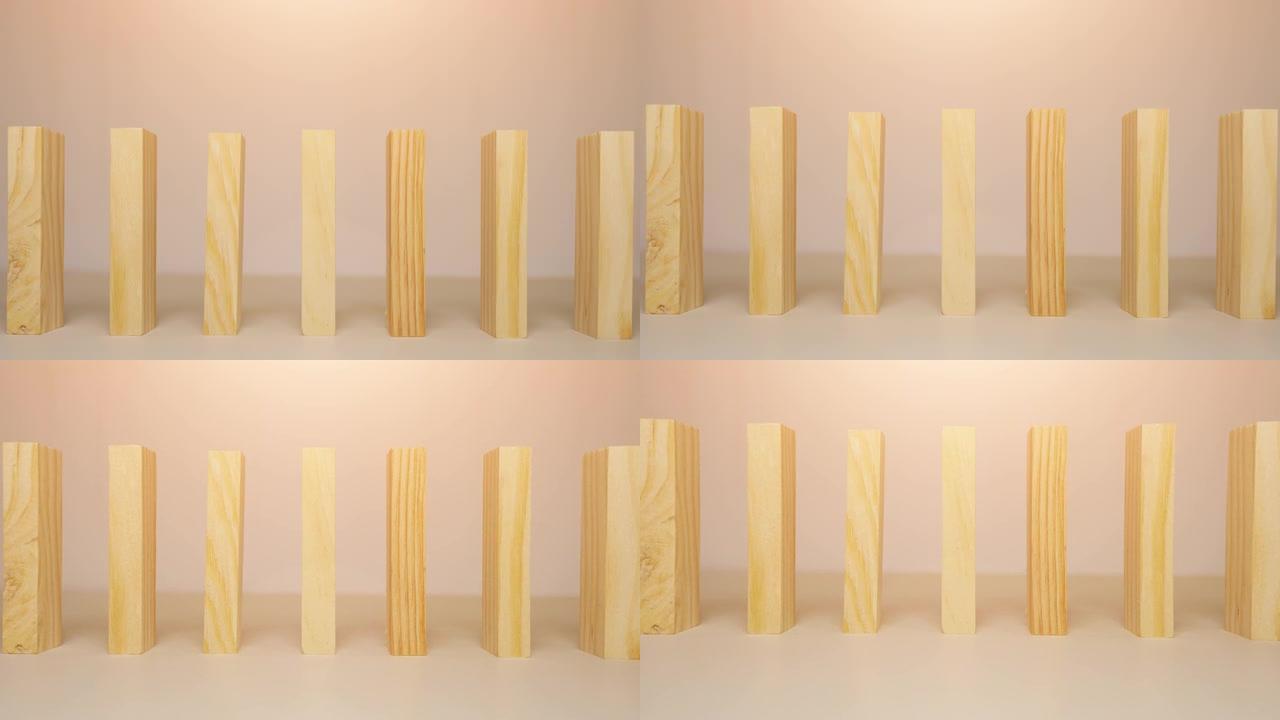 木块是堆叠的。用于多米诺骨牌游戏。阳光的动画。从上到下倾斜镜头。所有块都是直立的。