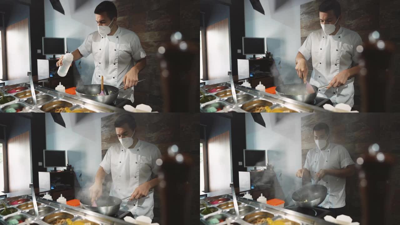 冠状病毒大流行期间在快餐店工作的男厨师