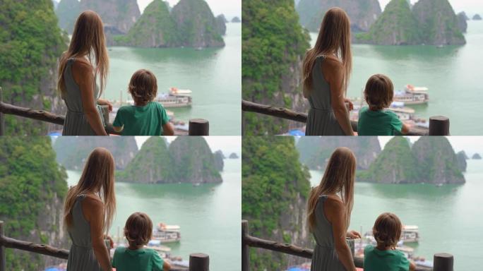 母子游客参观越南下龙湾国家公园，该公园由数千个大小石灰岩岛屿组成。越南旅游概念