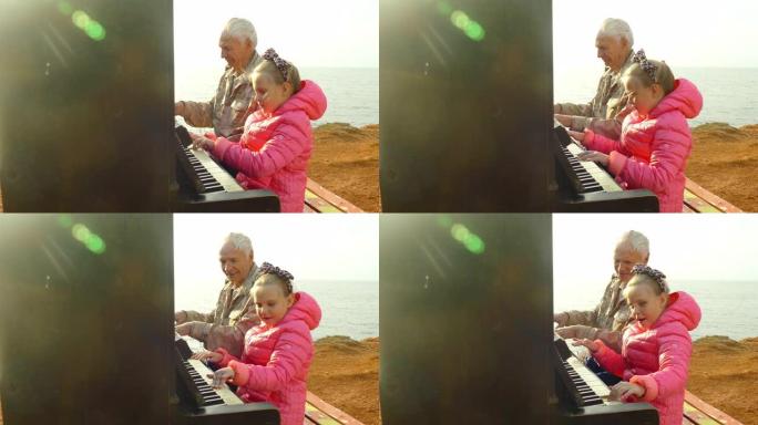 老人和小女孩在海滩上弹奏旧钢琴