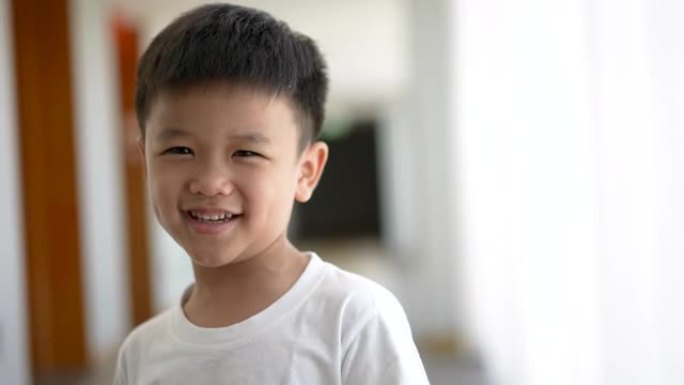 亚洲孩子微笑。幸福与纯真的概念