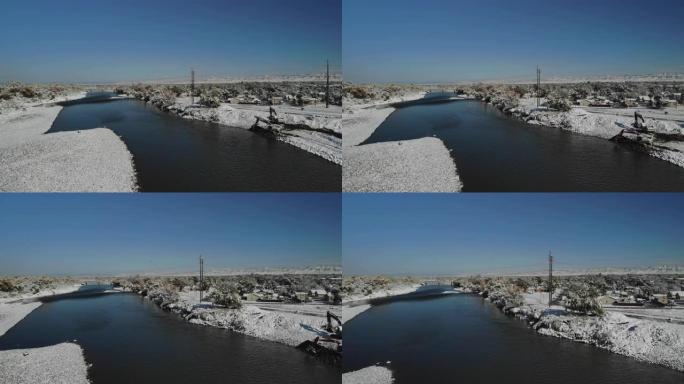 早冬晚秋暴风雪后科罗拉多河流域高压电力线4k空中无人机视频系列