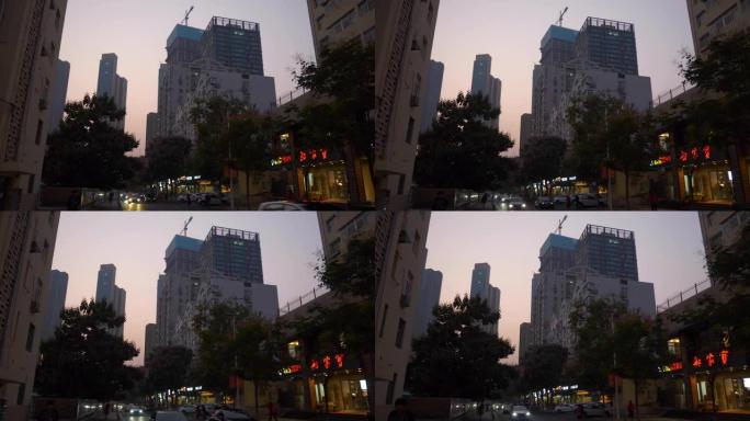 日落时间照明青岛市中心交通街市中心建设慢动作全景4k中国
