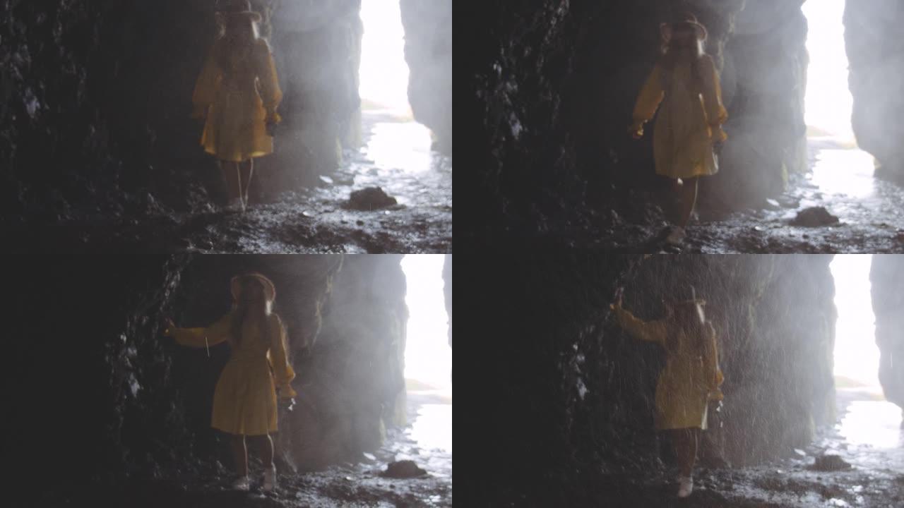 湿洞里的女人走向瀑布