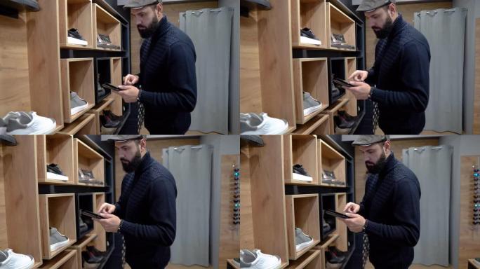 使用数字平板电脑进行在线制鞋业务的男性所有者