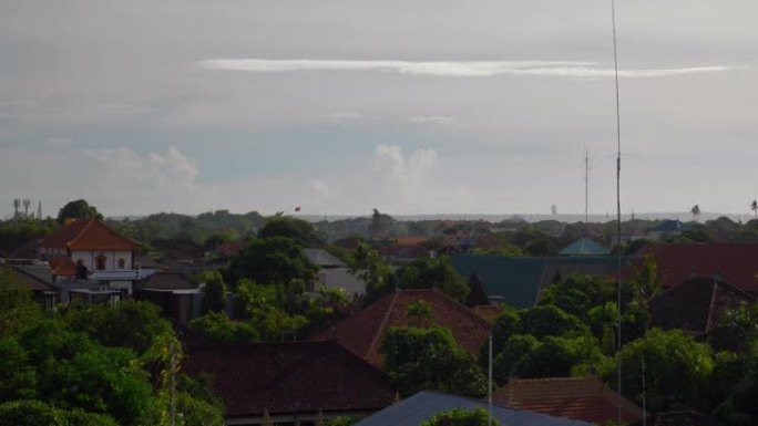 阳光明媚的夏日巴厘岛景观沙努尔地区酒店屋顶全景4k印度尼西亚