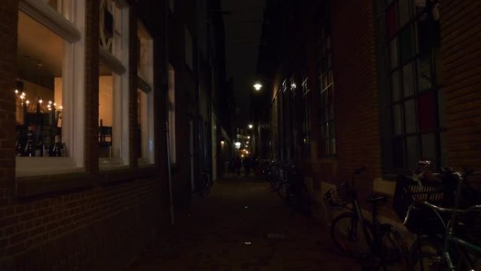 阿姆斯特丹市中心夜间照明著名拥挤街道全景4k荷兰