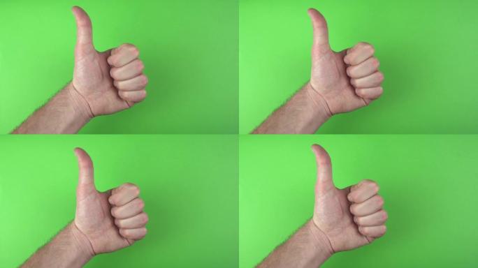 男性手在绿色背景上显示拇指的镜头。