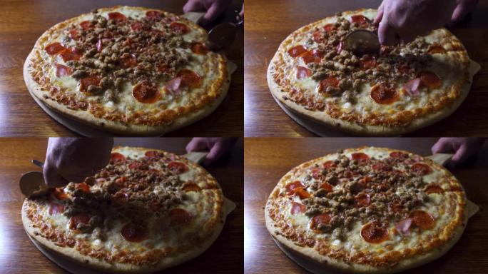 手工切割新鲜出炉的肉类爱好者披萨