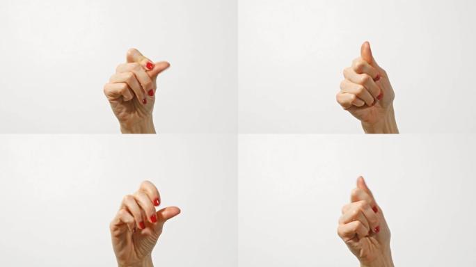 女人手按，弹指。手势，标志，符号。没有说话概念的交流。