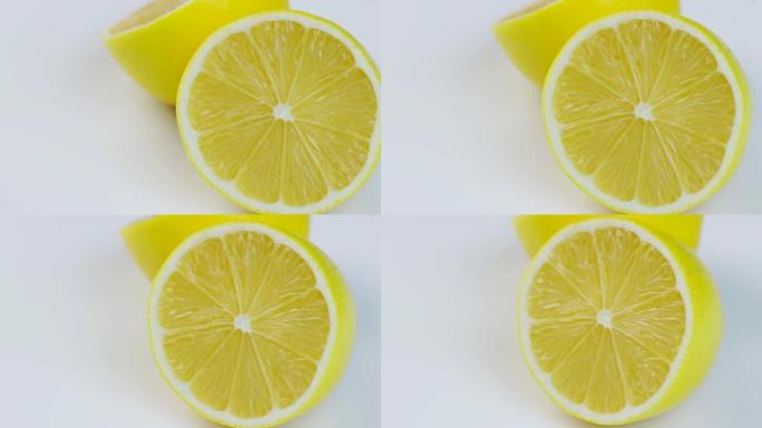 旋转成圆形的新鲜柠檬，白色背景和文本空间