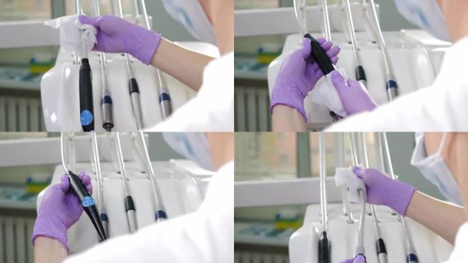 牙科医疗机构的加工、清洁、消毒和消毒，经营医疗机构。用消毒液擦拭医疗器械的特写镜头。4 k镜头