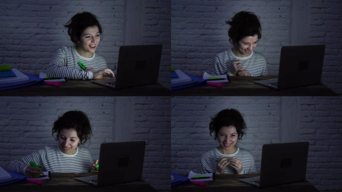 4k宽滑块mov在快乐休闲美女的喜怒无常的光线下，晚上在笔记本电脑上工作和学习。在家工作，电子学习和