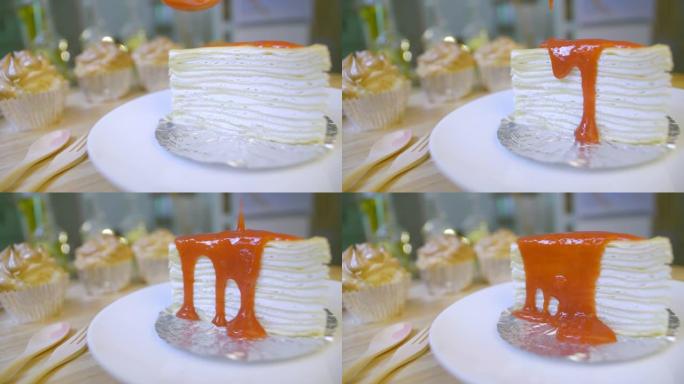 香草绉纱蛋糕浇头配草莓酱，甜点塔西蛋糕。