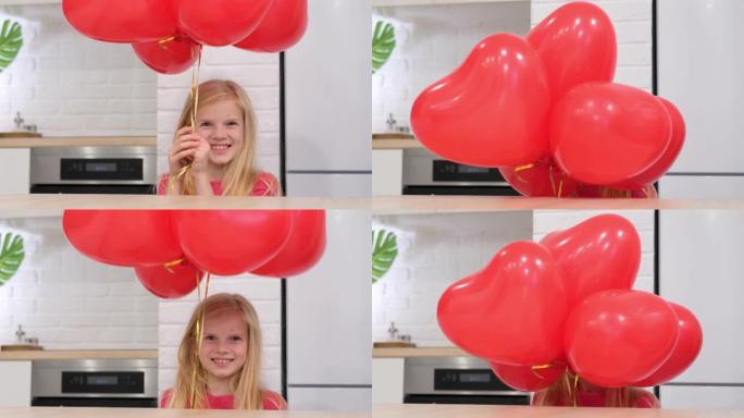隐藏在红色心形气球后面并从气球后面出现的微笑女孩的肖像。庆祝情人节。慢动作