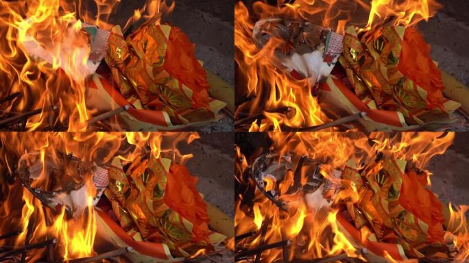 慢动作在中国寺庙的炉子上燃烧乔斯纸