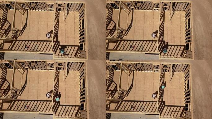 木匠构筑房屋的无人机视图