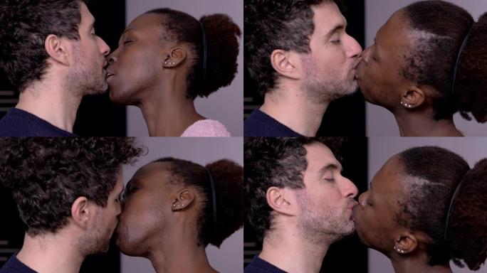 白人男人和黑人女人之间甜蜜温柔的吻。跨种族的爱，吸引力