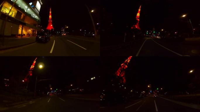 晚上开车穿过东京铁塔。向上看。位于日本东京的东京铁塔