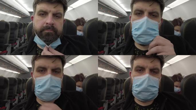 在新型冠状病毒肺炎冠状病毒大流行期间乘坐飞机飞行。飞机上的蒙面人。特写。