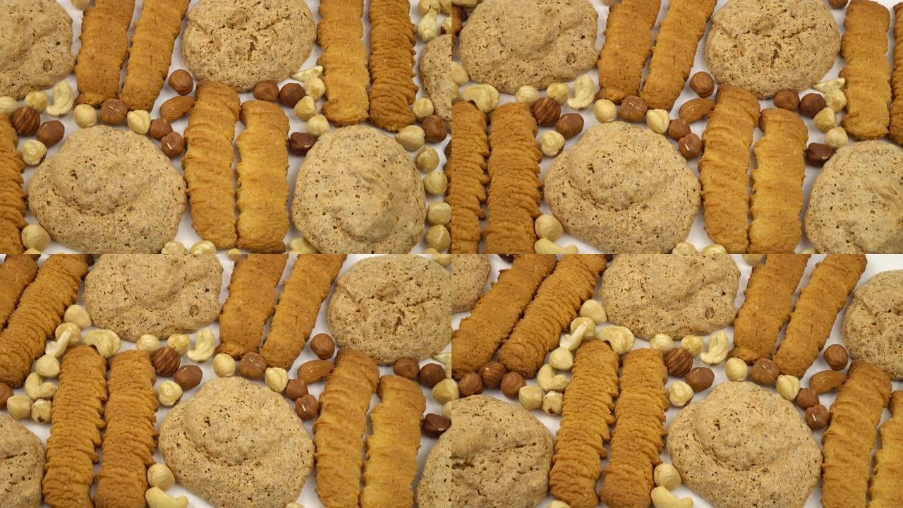 什锦饼干，包括白色背景上的坚果饼干和脆饼
