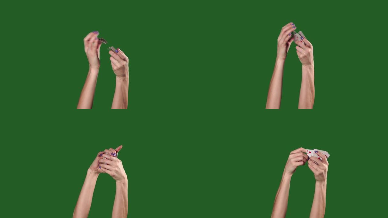 Chromakey。绿色屏幕。女人的手会干扰一副纸牌并将其扔出。