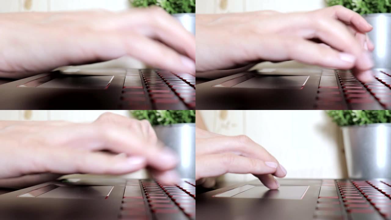 女女人双手滚动触摸板并在笔记本电脑的键盘上打字，没有脸的女人坐在桌子旁自由工作在家，在社交网络上发表