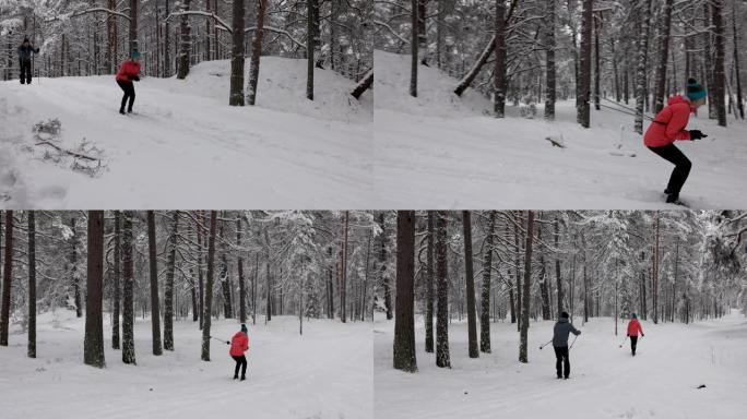 滑雪旅游-年轻夫妇在白雪皑皑的冬季森林中滑雪下山