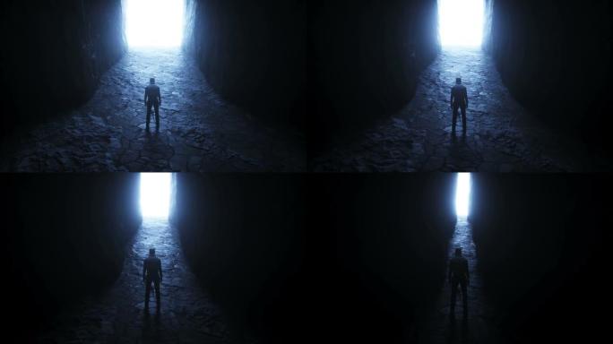 一个孤独的人站在移动的光门前。