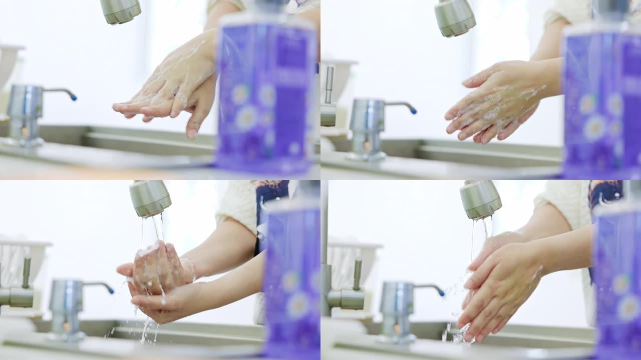 女人在水槽里用洗手液洗手。清洁手概念的想法。冠状病毒保护。