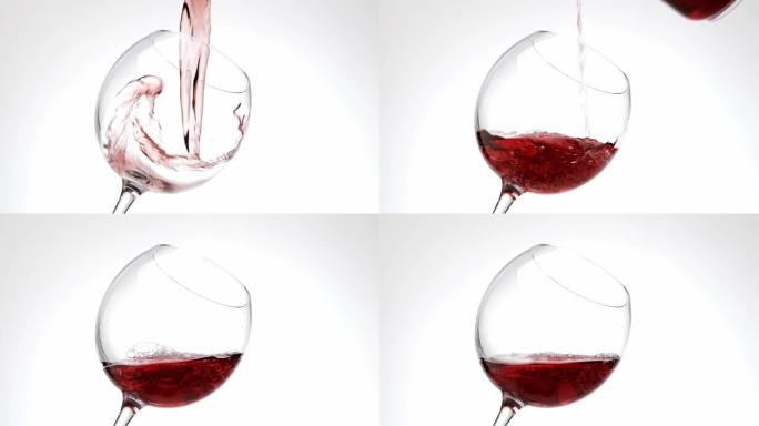 白色背景上的一杯红酒特写镜头，慢动作。倒入酒杯的葡萄酒