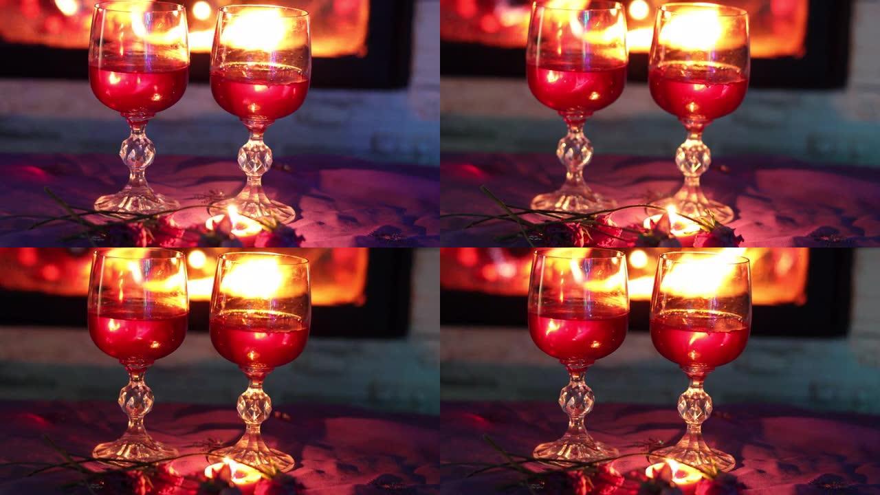 两杯红酒靠近壁炉，背景中闪烁的灯笼，情人节