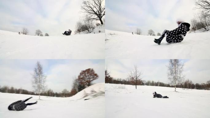 女孩爬上一座白雪覆盖的小山，坐在雪橇上，滑到山底。在雪地里从头到脚。