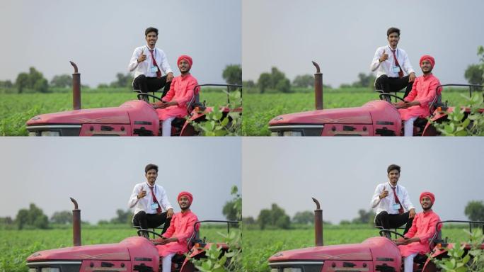 年轻的印度农民和农艺师在拖拉机上检查农业领域