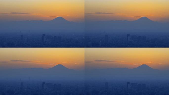 城市建筑和富士山在黄昏