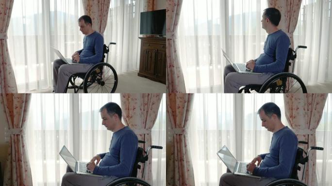 坐在轮椅上的年轻人在家里的笔记本电脑上工作
