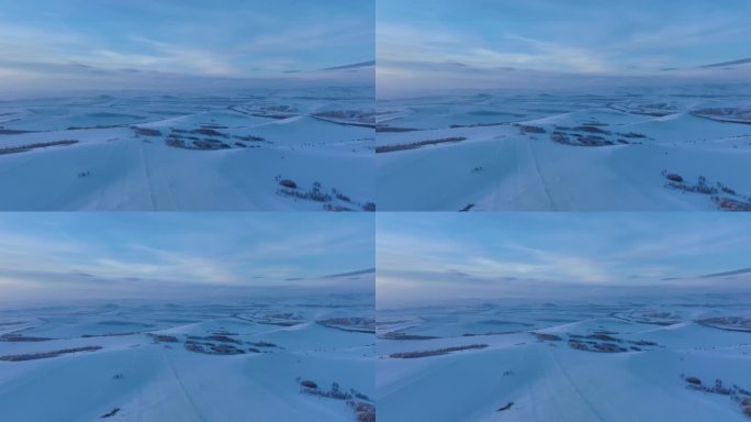 航拍严冬暮色中的辽阔雪原