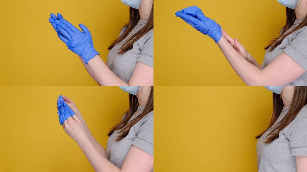 戴着医用口罩的年轻女子的特写镜头取下医用手套，扔进垃圾桶，孤立在黄色工作室背景上，有广告复制空间。病