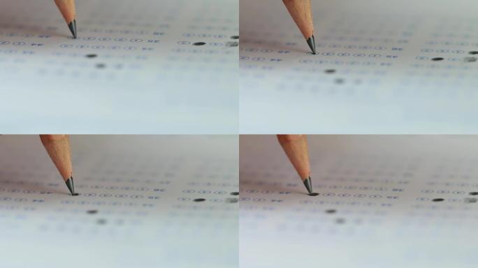 学生手工测试在大学或大学的学校期末考试中，用铅笔在答题纸上的选定选项进行考试。在考试课堂中进行多项选